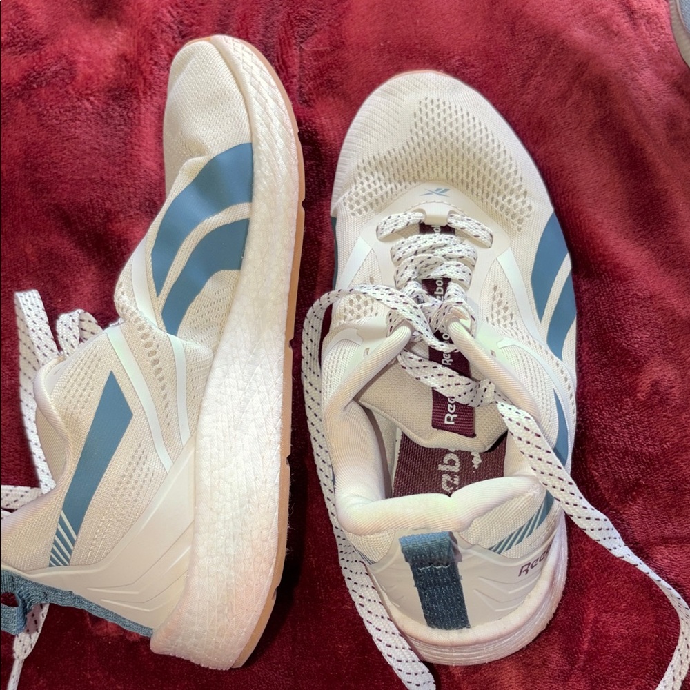 Reebok White Sneakers with Light Blue Stripes